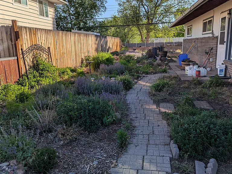 Large lot with great gardening opportunity.