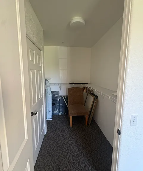Large walk in closet in bedroom