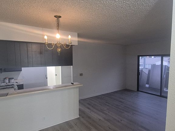 FROM THE DOOR LOOKING IN TO LIVING ROOM