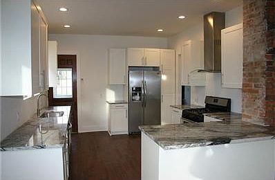 Sharp kitchen with new can lights and a large pantry!