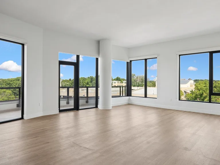 Expansive living room with ample natural light