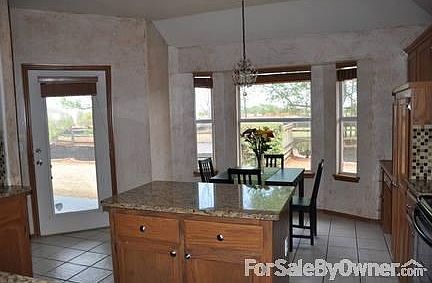 Kitchen Bay Window
						:
						Island, eating area, bay window, updated granite countertops.