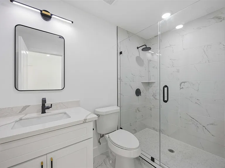 801 E 32nd 1/2 St #A — Photo 31