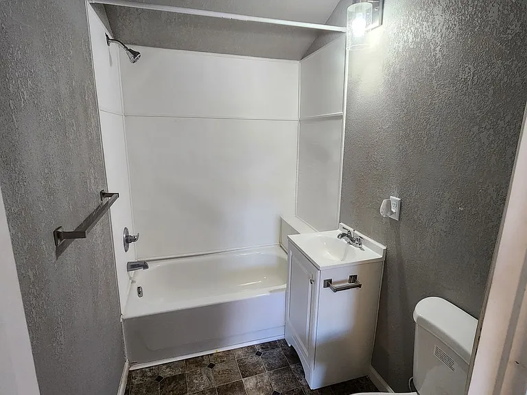 Centrally Located One Bedroom Duplex — Photo 8