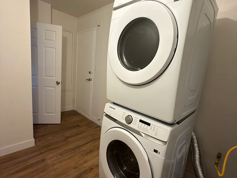 Shared washer and dryer (brand new) in the laundry room.