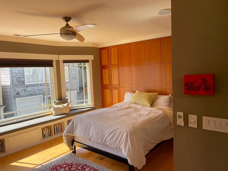 Master bedroom (with built-ins and slide out side tables)
