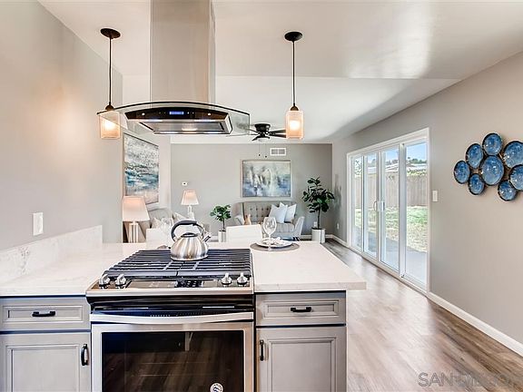 Open concept kitchen, converse with guests while you cook on brand new stove