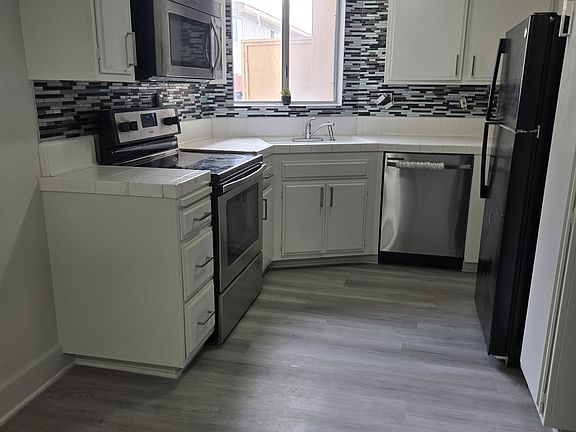 Fridge,stove,dishwasher,microwave washer dryer unit included