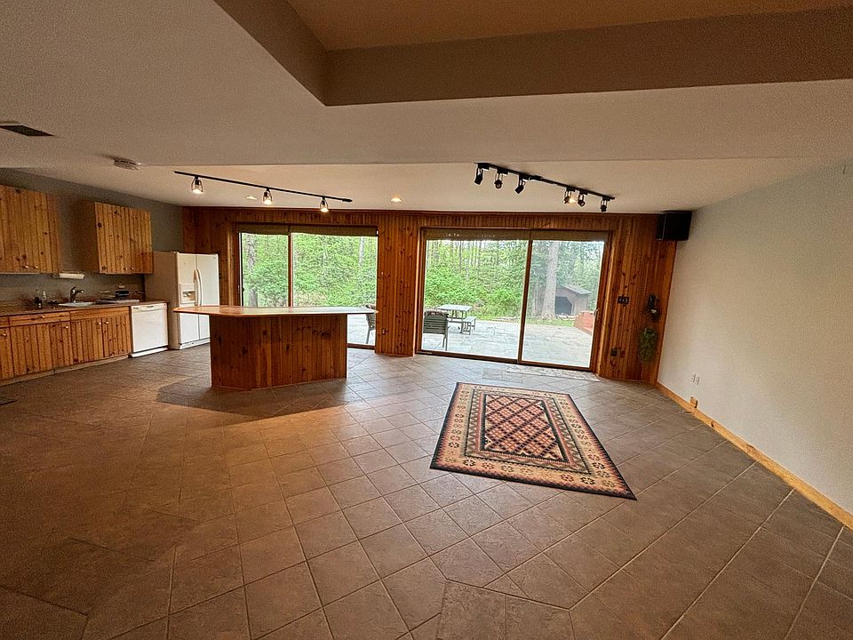 Kitchen and dining area with built in island/bar