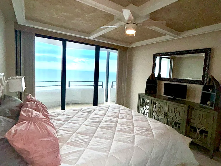Bedroom #2 with unique ceiling and remote controlled ceiling fan