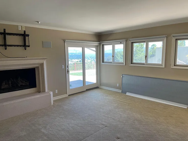 Master bedroom with View and fireplace