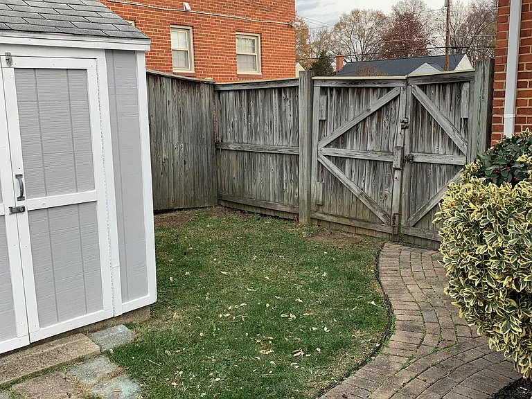 Back yard (two sheds, raised garden, six foot privacy fence)