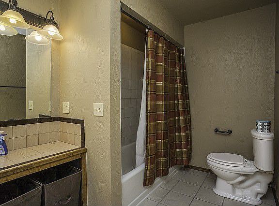 Full bath with ceramic countertop
