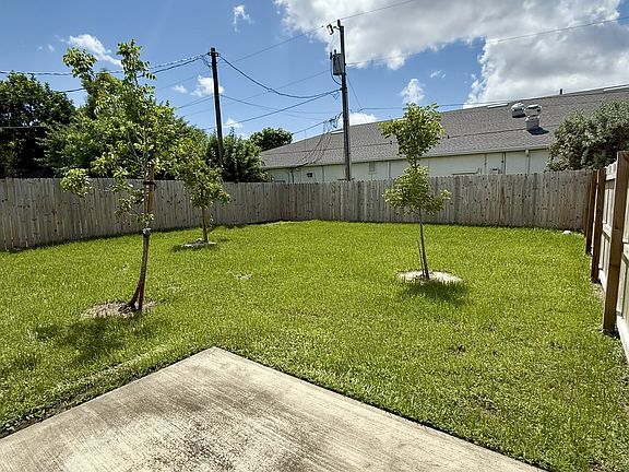Privately fenced backyard