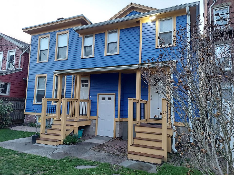 1. Private entry in rear of building facing large yard