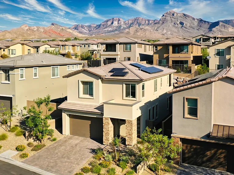 View of the home and surrounding Red Rock canyon