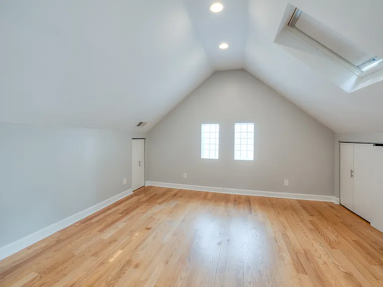 Top floor front bedroom with skylights