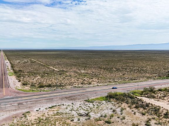 Looking North at the intersection of Ranch Rd 1437 and US Highway 62/180. Pending a survey, sellers may not own a small tract of this intersection on the West side corner
