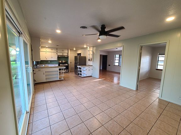 Entering from the backdoor (keyless entry), straight into the open kitchen and dining/living area