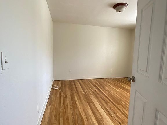 First bedroom off living room. Large room that could hold a king bed.