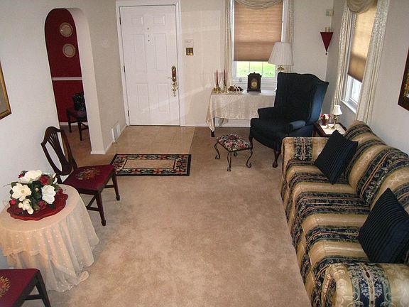 Living room with marble foyer