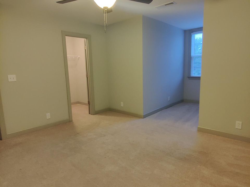 Room View from door, showing walk in closet.