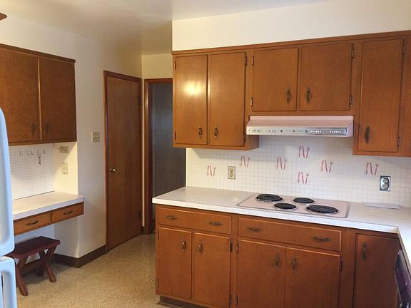 Kitchen view from back door to living room