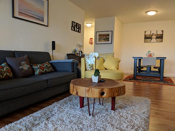 Spacious living room with dining table nook