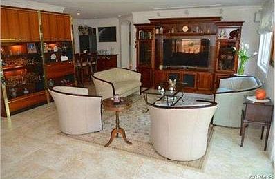 Family Room View toward Wet Bar and Downstairs Master Entrance