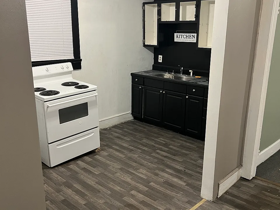 Standing at Entry door looking into kitchen