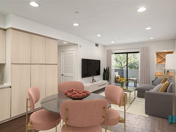 Open-Concept Floor Plan with Built-In Cabinet Storage and Patio