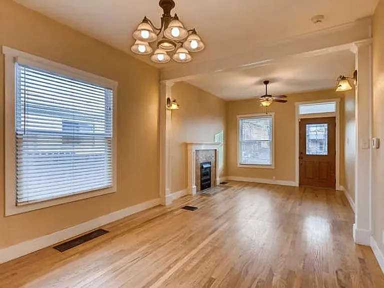 Warm hardwoods and natural light brighten this home
