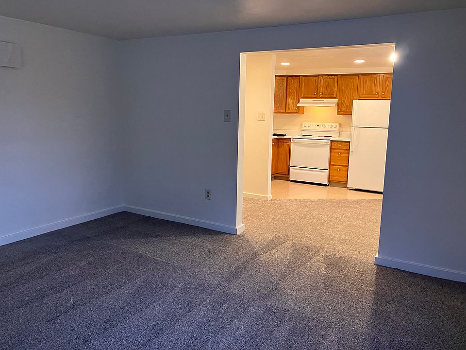 living room looking to dining room, kitchen