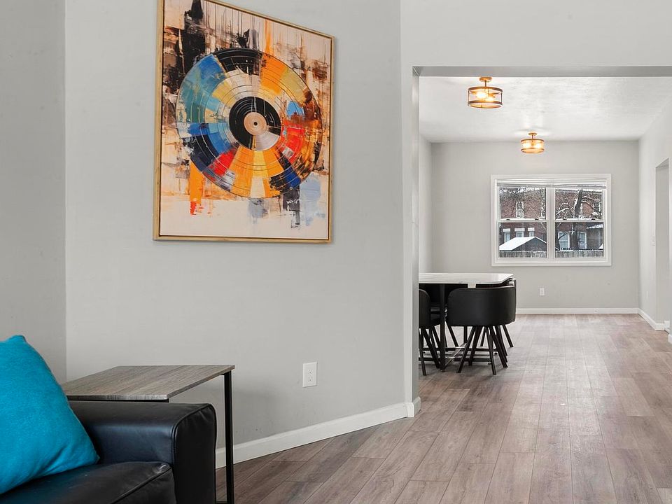 Furnished living area leading to dining room