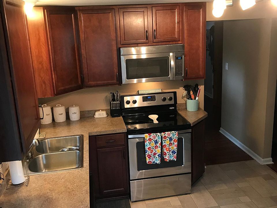 New tile floor, cabinets, dishwasher, included stainless appliances
