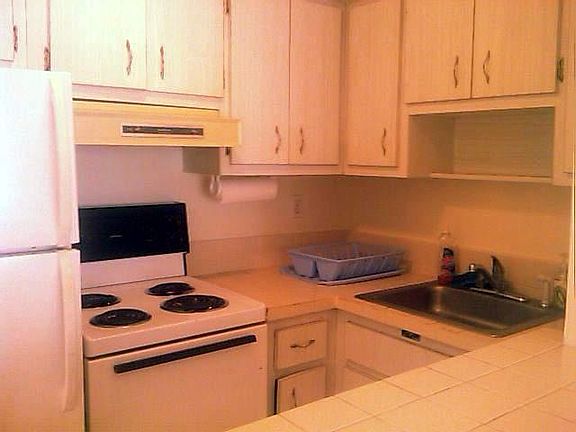 kitchen being updated with quartz counter tops