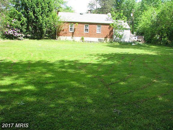 Photo taken back of lot looking at home