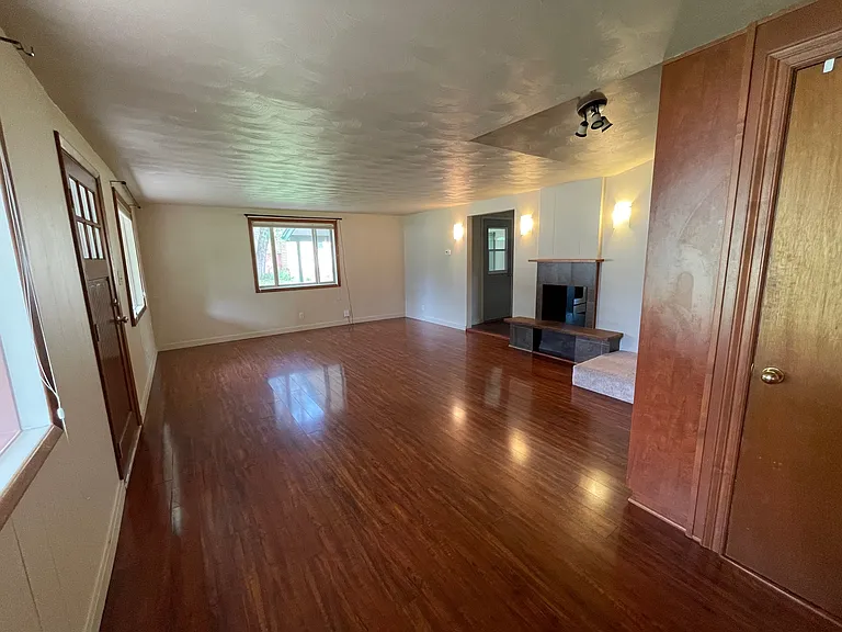 Main living area with storage closet.