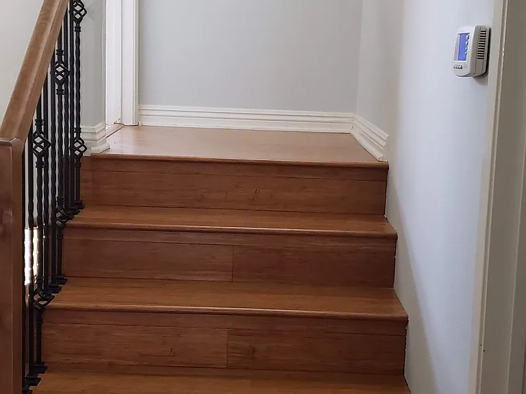 stairs leading up to the 3rd bedroom