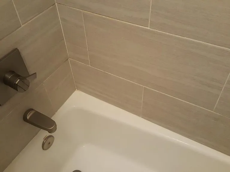 Bath with modern tile and brushed nickel fixtures