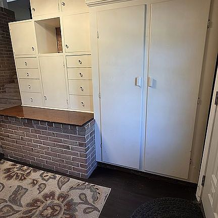 Built in coat closet in foye