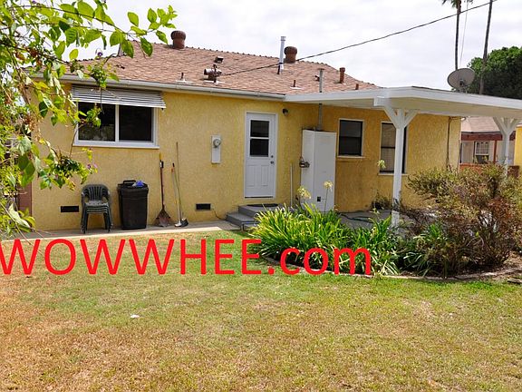 backyard with the covered patio great for entertaining!