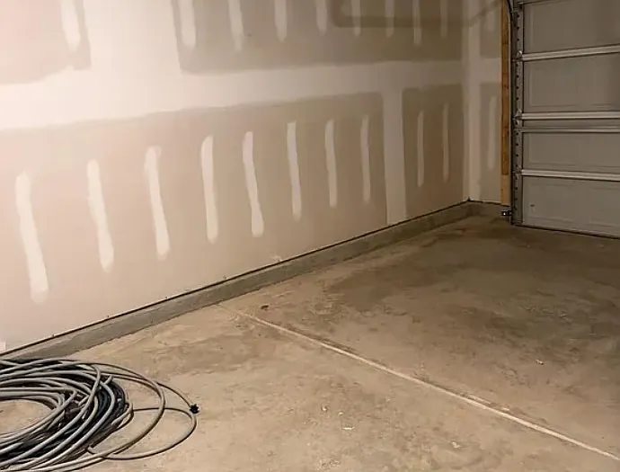 Street-facing, 1- car garage with BEV charger installed