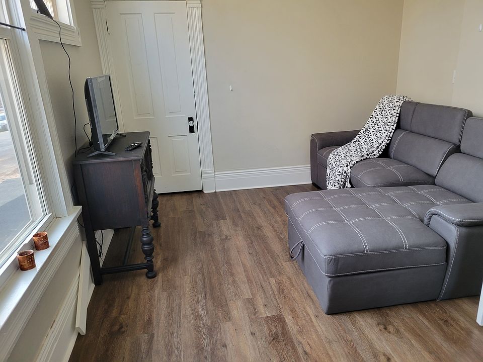 Living room with full size sofa sleeper