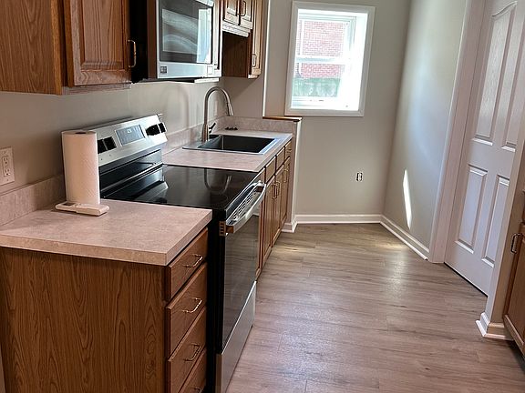 Brand new stainless steel appliances.