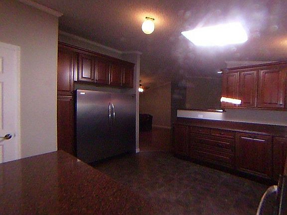 Double sized side-by-side frig/freezer.