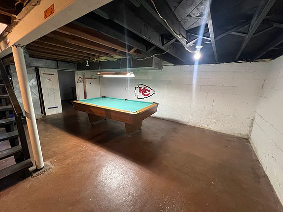basement hangout area. two storage rooms
