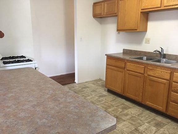 Galley Kitchen with stove.