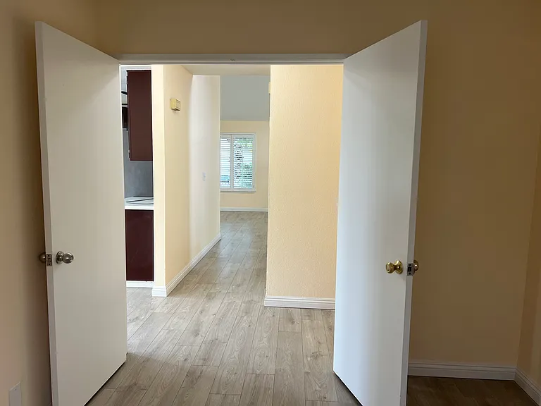 hallway from downstair bedroom to kitchen