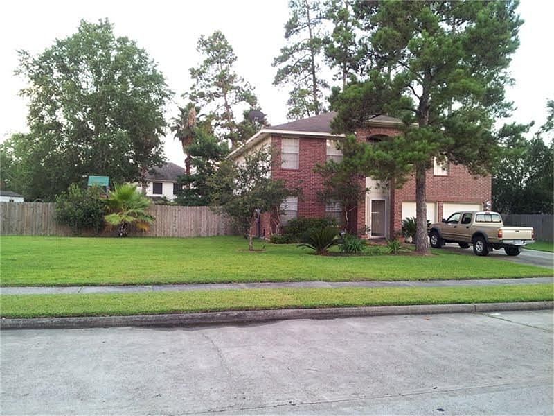 THIS HOME SITS IN AN OVER SIZE YARD
